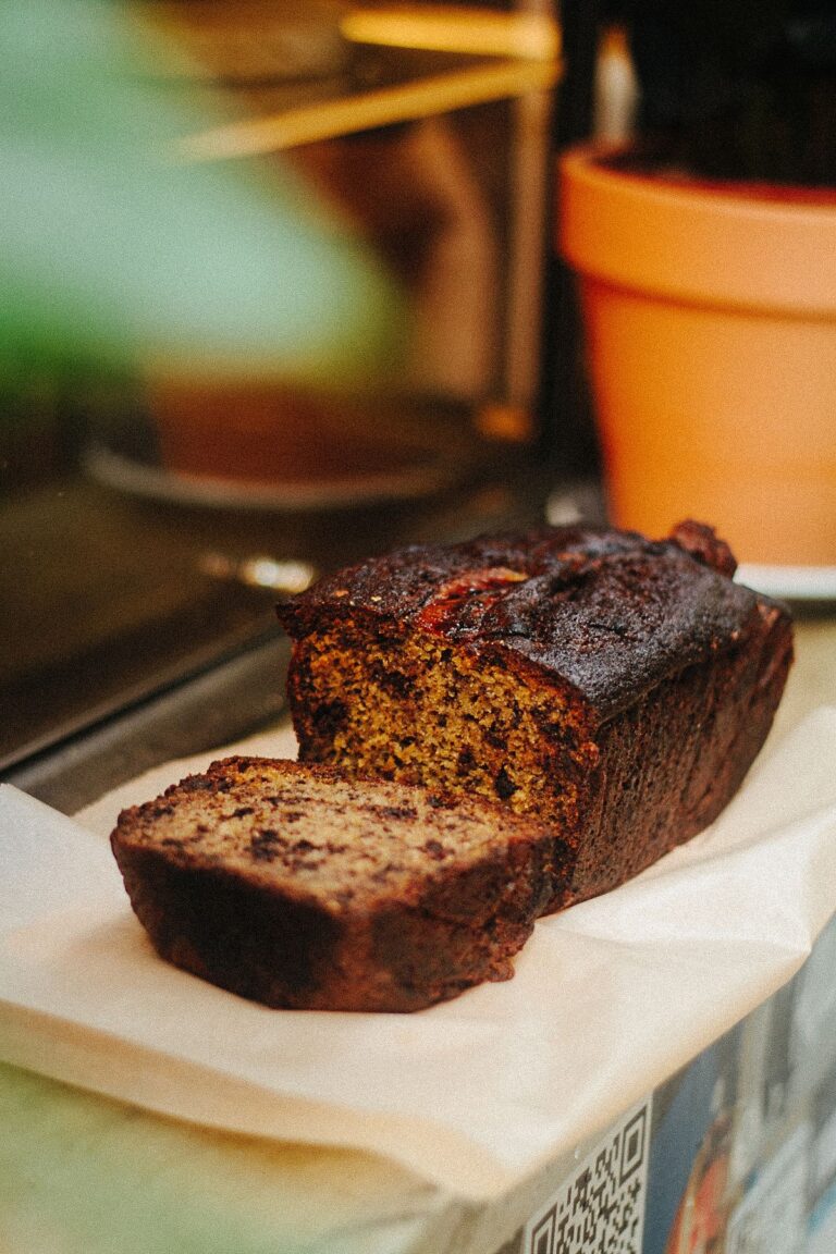 Sliced snickerdoodle banana bread with a cinnamon sugar crust
