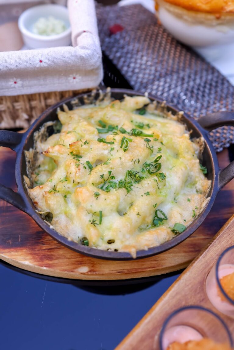Creamy baked soul food mac and cheese with a golden top