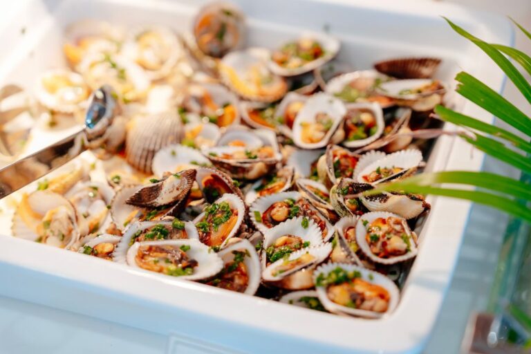 Golden baked clams in their shells with crispy topping